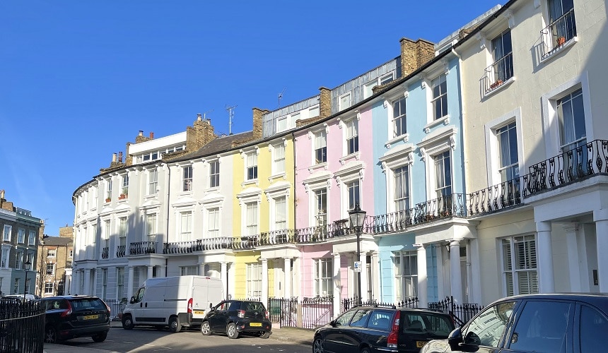 Street with pastel coloured houses in Primrose Hill, London